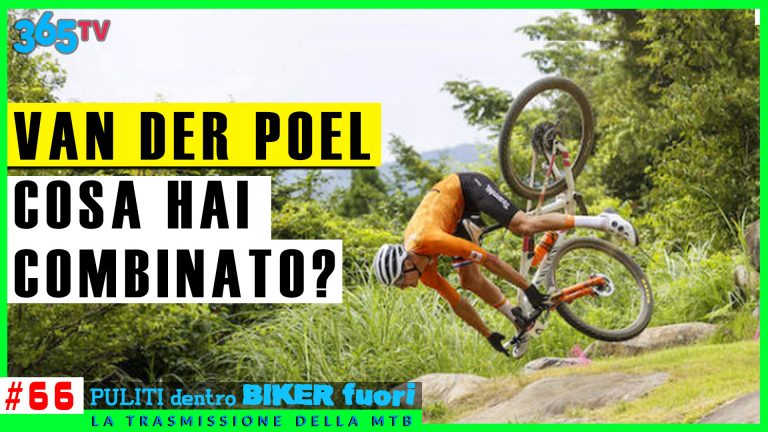 1. Tecnico ciclista di montagna in caduta durante gara su sentieri sterrati.