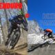 Enduro in montagna con biker su sentieri sterrati e montagne maestose potrebbe essere il tema dell'immagine, promuovendo l'enduro e il bike park.